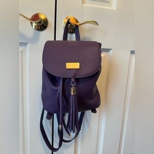 Monat Bag Purse PURPLE Textured Vinyl Tassel Lined Back Pack Adjustable Straps